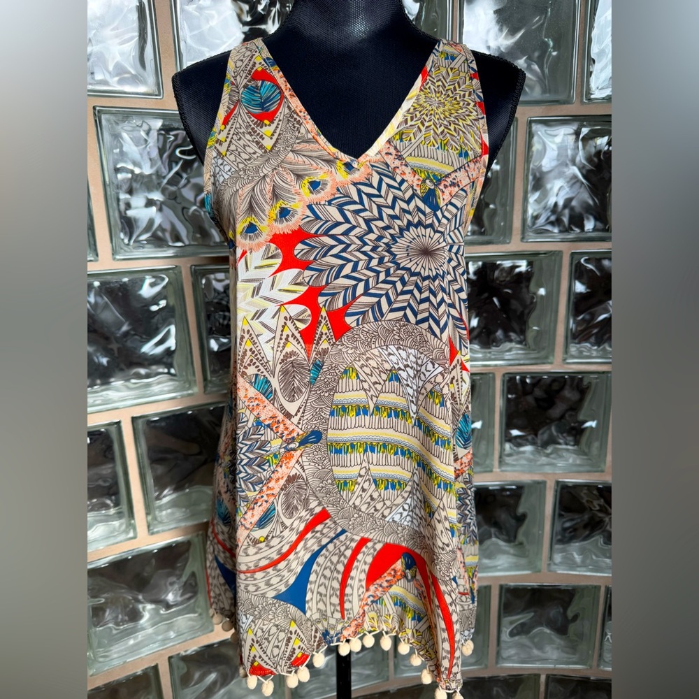 Umgee Women’s Babydoll Tank.
Preowned/Good Condition!